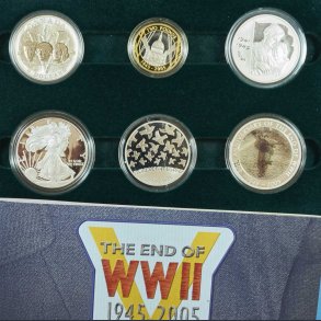 Udland møntsæt i skrin