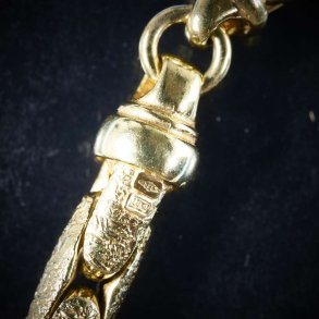 Guldhalsk&aelig;der og armb&aring;nd