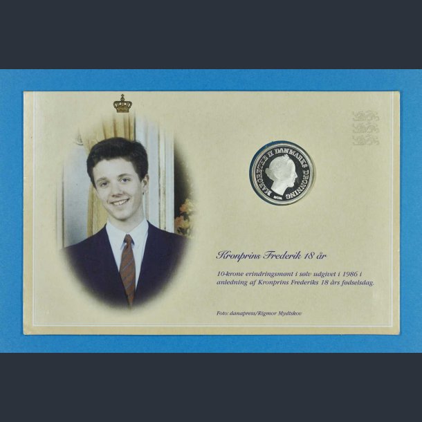 10 kr. 1986 Kronprins Frederik 18 r i slv - Isat i papfoderal med foto af Kronprinsen 