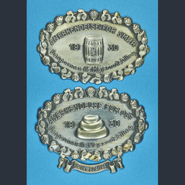 Anerkendelse for Smr samt slvmedalje for Ost 1930 - 2 skilte i slv